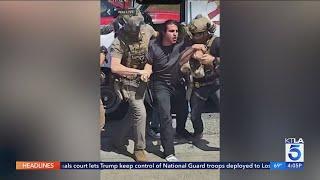 Man arrested, forcefully removed, while filming immigration raid in Pacoima