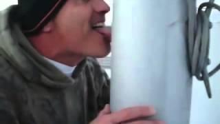 Dude Tries To Prove Myth Wrong By Sticking His Tongue To a Cold Pole