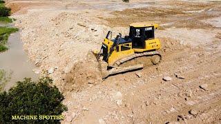 Bulldozer Pushing Dirt Plunge Into Water - Dump Trucks Pouring Dirt To Slope