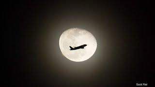 Slow Motion Plane and Moon - A Pair of San Jose bound planes near the moon