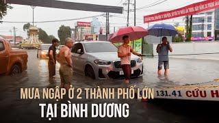 Bình Dương: Mưa ngập ở 2 thành phố, giao thông tắc nghẽn