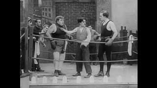 The Knockout (1914) Roscoe Arbuckle, Minta Durfee, Al St. John, Edgar Kennedy, Charles Chaplin