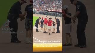 Baseball: Kids ran onto Comerica Park (Detroit Tigers Game)