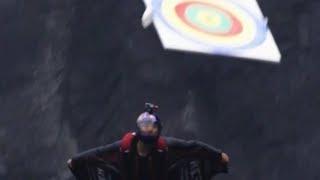 Wingsuit flying target strike wows spectators | CCTV English