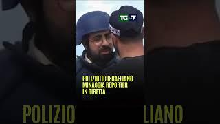 Un reporter viene minacciato in diretta da un poliziotto israeliano