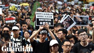 Hundreds of thousands take to streets in renewed Hong Kong protests