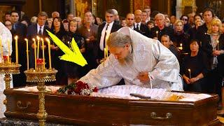 During the funeral, the priest noticed something strange. Taking a closer look, he froze in place!