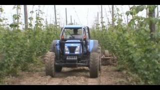 New Holland T4050 Working in a Hops Field