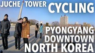 NORTH KOREA | CYCLING THROUGH THE MOST ICONIC TOWER IN PYONGYANG CITY.