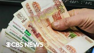 Ruble value tanks as sanctions slam Russian economy