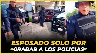 Esposando solo por GRABAR “acto” de los Policías