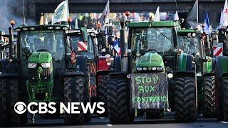 Farmers protest in France, blocking roads to Paris with manure and farm equipment