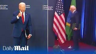 Joe Biden awkwardly stumbles into pole and doesn't shake President Lula's hand