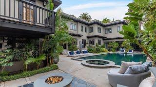 $17,500,00! Imposing and supremely private home in Santa Monica with a lushly landscaped garden