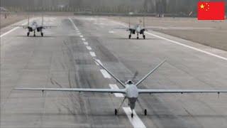 PLAAF GJ-2 armed reconnaissance drone with two J-16 fighters during MUM-T training
