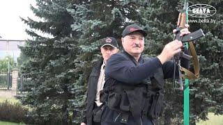 Belarus: video shows Lukashenko holding an automatic rifle, wearing body armour | AFP