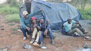 The life of gold panners. Weeks in the bush with only a plastic to shield you from terrific weather.