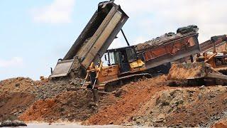 New Project Beach Land Filling Process Dump Truck Unloading Rock Dirt And Bulldozer Pushing Rock