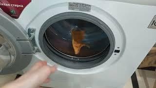 Throwing clothes into the drum during the spin 1400 rpm