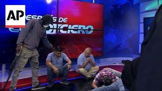 Armed men storm Ecuador TV studio during live broadcast