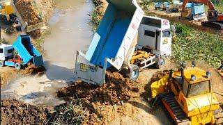 Delete Pond by skill old dozer Komatsu Push soil in the water with 5T Dump truck Transport soil