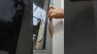 mastic man- Sealant application window frame to render