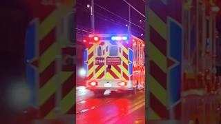Ambulance responding in a rainy day 