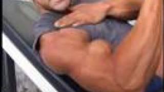 Bodybuilder Chris Jalali poses biceps