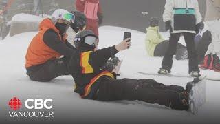 Skiers and snowboarders make their way to Cypress Mountain as ski season starts