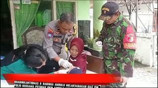 Bhabinkamtibmas dan Babinsa Ambulu melaksanakan giat PIN Polio kepada balita di Posyandu