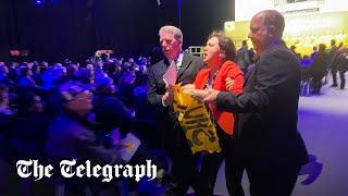 Shell protesters rush stage as hijacked AGM descends into chaos