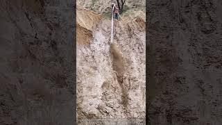 Human vs. Mountain : Water Cannon Erosion for Dam Builders