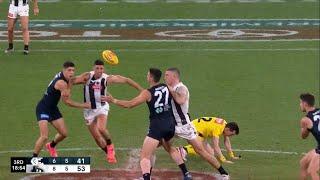 Scott Pendlebury knocking over an umpire in centre bounce