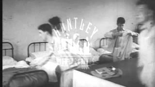 Dormitory Waking and Cold Shower, 1950's.  Archive film 93842