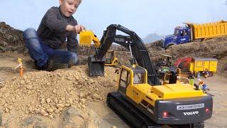 Bruder VOLVO Excavator : Digging out Dinosaur Skeleton : Full Backhoe Video for Children!