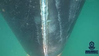 Welding underwater vertical down (Filmed under darkened lens)