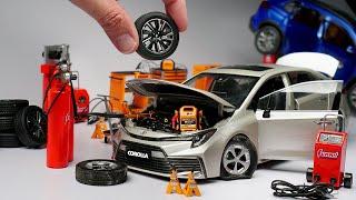 Miniature Toyota Corolla Tyre Puncture & Brake Fail - Changing Tyres 1:18 Scale Diecast Model