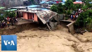 Home Washed Away in Indonesia Flash Flood