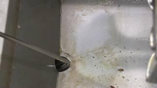 Using a Fryer's Friend to Unclog Drains