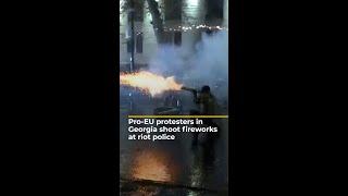 Protesters in Georgia shoot fireworks at riot police | AJ #shorts