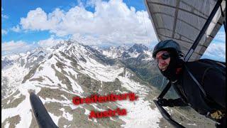 HANGGLIDING OVER SNOWCAPPED MOUNTAINS - GREIFENBURG, AUSTRIA