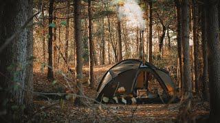 Camping comfortably in a hot tent in the winter forest