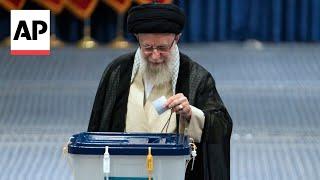 Khamenei votes as Iranians go to the polls to replace president killed in helicopter crash