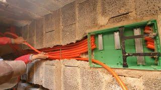 Installing the electricity distribution panel and installing the electrical pipes inside it