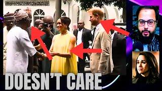 Senior Nigerian Official Pulls Away from Meghan when she Approached him - Meg did curtsy - Awkward