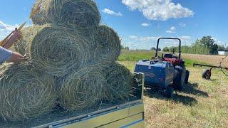 Range Road RRF900 mini round baler. Making our first bale!