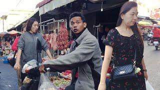 Street food stalls and fresh fish and vegetables in Phnom Penh, Cambodia.