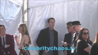 Actor Sean Penn smoking a cigarette outside Independent Spirit Awards