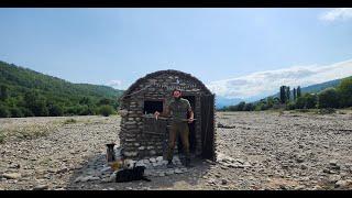 I built a hut very far away. into the rivers and lived there for 1 month 14 days with his dogs.