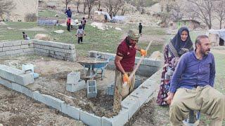 Nomadic life, moving blocks to build love huts and baking local bread